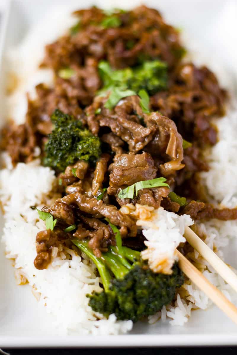 Quick Healthy Beef and Broccoli with large broccoli florets and saucy beef strips