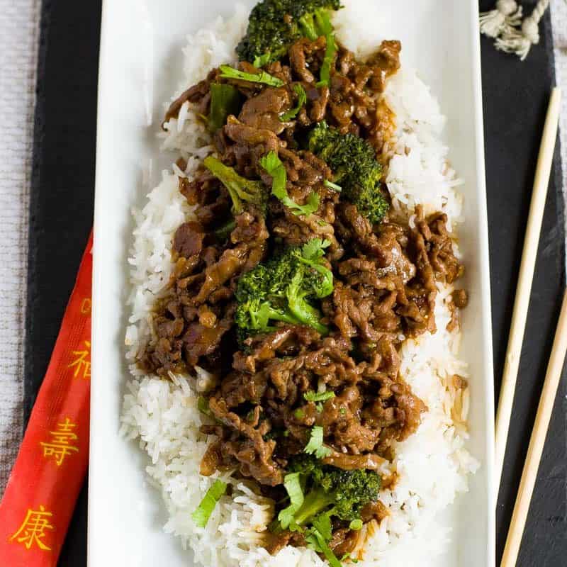 Healthy Beef and Broccoli on plate with fluffy white rice