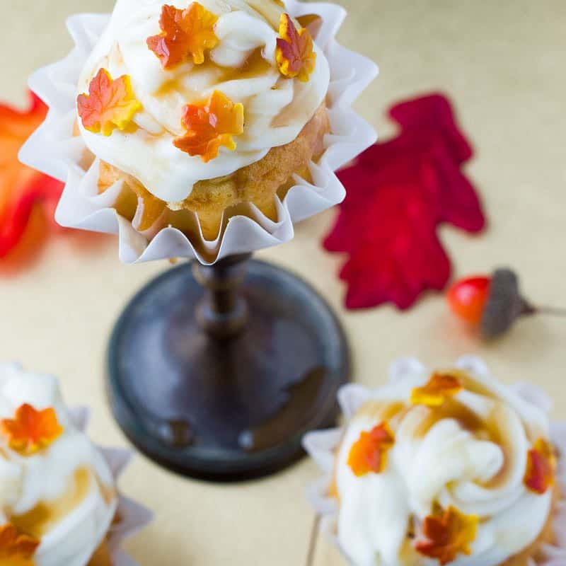 Three carrot cupcakes with fall candy leaves
