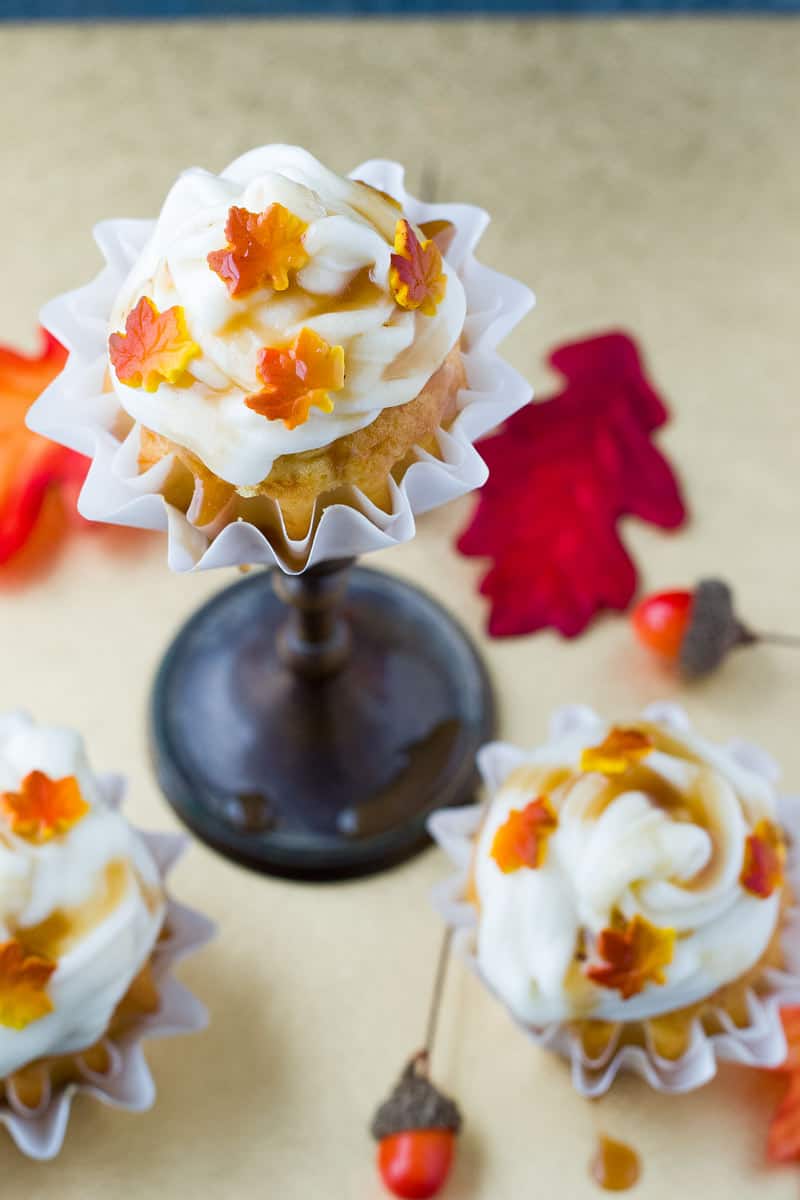 Thanksgiving Carrot Cupcakes - Three carrot cupcakes with fall candy leaves